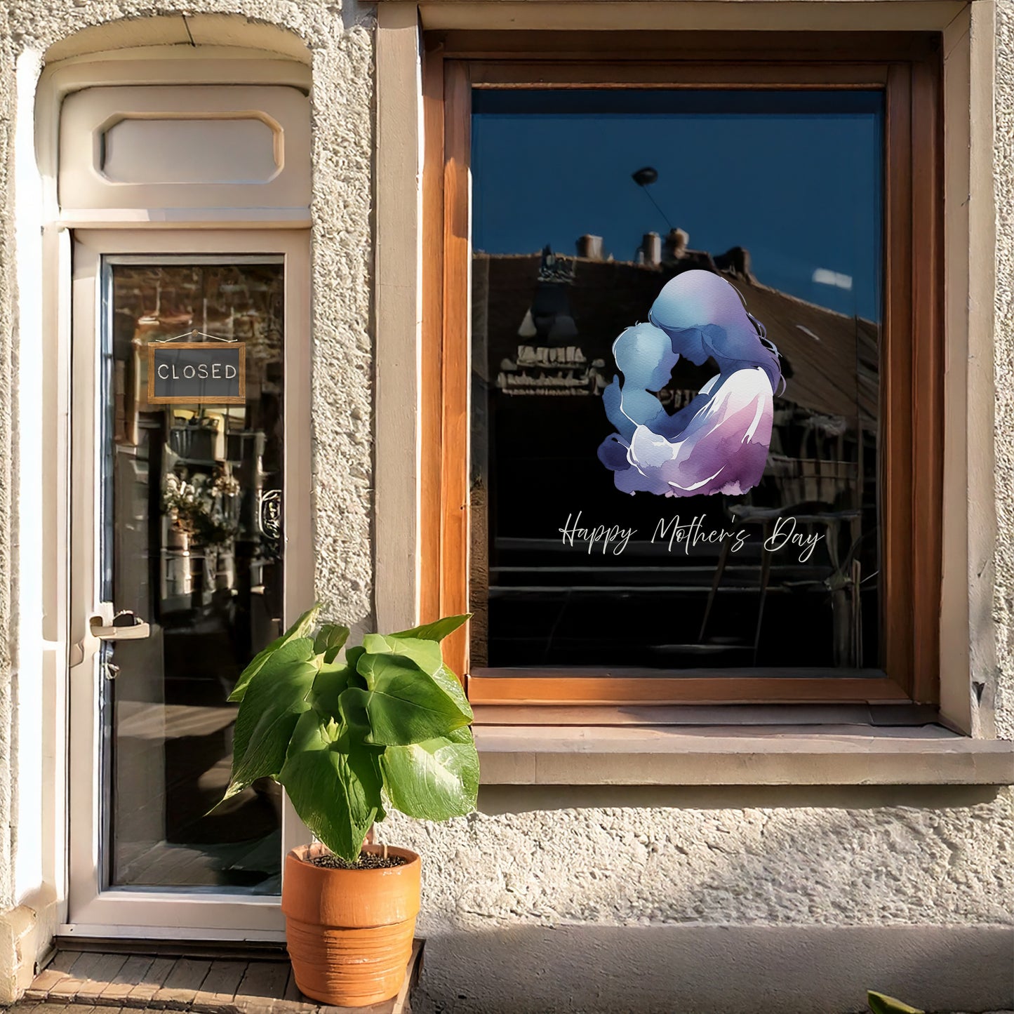 Mother Cuddling Baby Mother's Day Window Decal